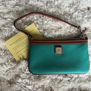 Dooney & Bourke pebble grain large wristlet in teal